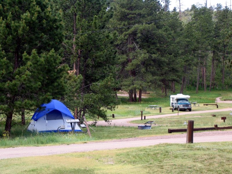tent and camper in campground