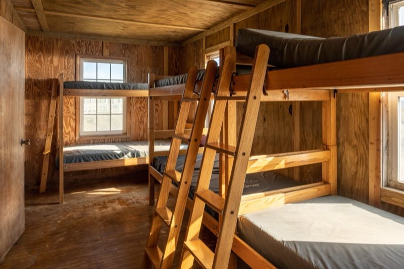Two sets of bunk beds.