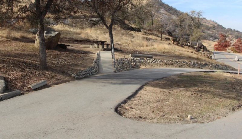 Pull Through driveway. From the gate first site on right.