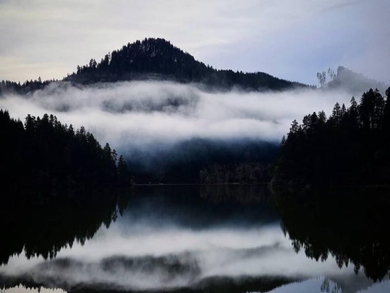 A view of Loon Lake with fog settling in above the lake