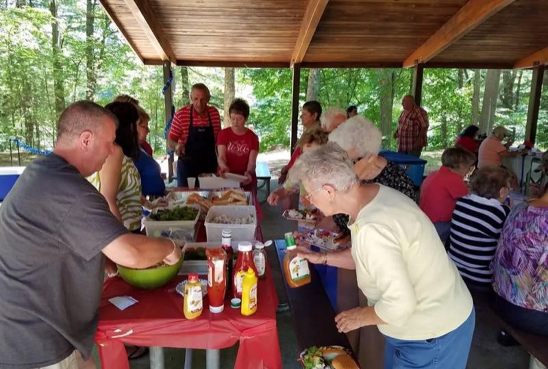 large Shelter Site 1, serving food with friends and families.